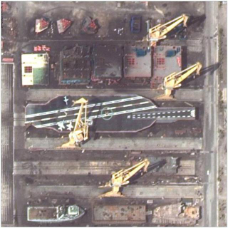 Illustration for article titled Iran Is Building A Gigantic Mock-Up Of A U.S. Aircraft Carrier